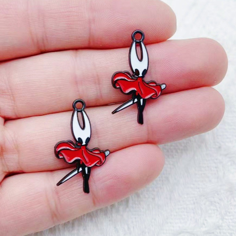 10 pendentifs en alliage motif - Party Games Questions avis et prix